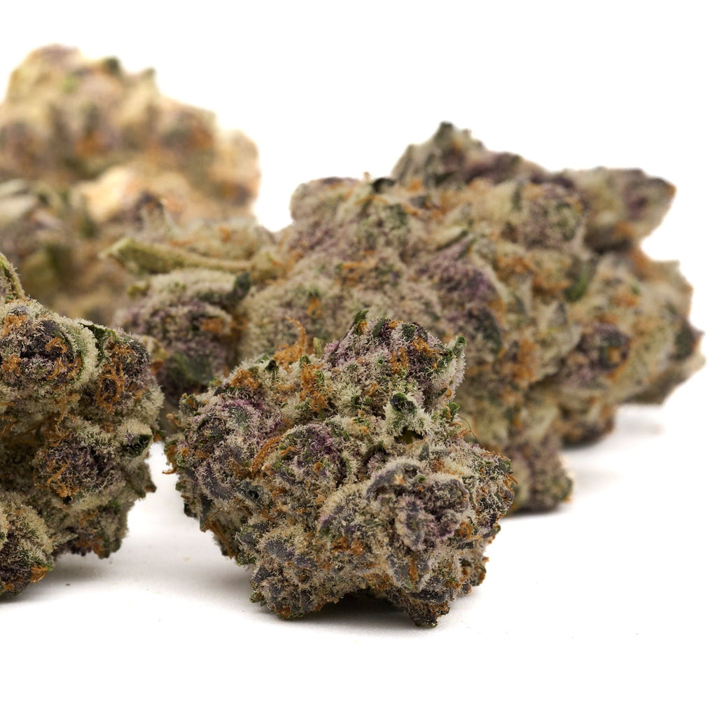 Purple and green cannabis buds of Ceral Milk Indoor THCa Flower 5 gram package