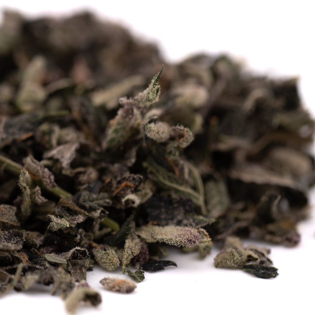 Pile of dried green tea leaves for Mac and Gary Indoor Trim Wholesale 1LB, ideal for thca trim and sugar leaves wholesale